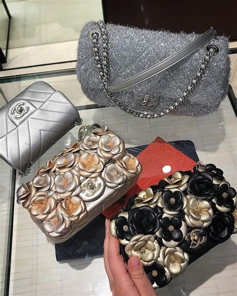 chanel bag with flower on chain